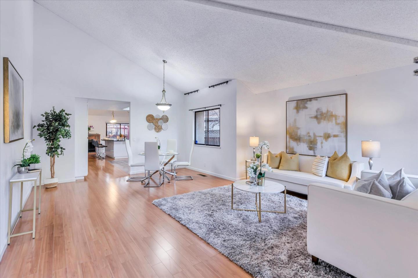 499 Bayview Park Drive Milpitas, CA 95035 - Photo 4 of 41 a living room with furniture and wooden floor