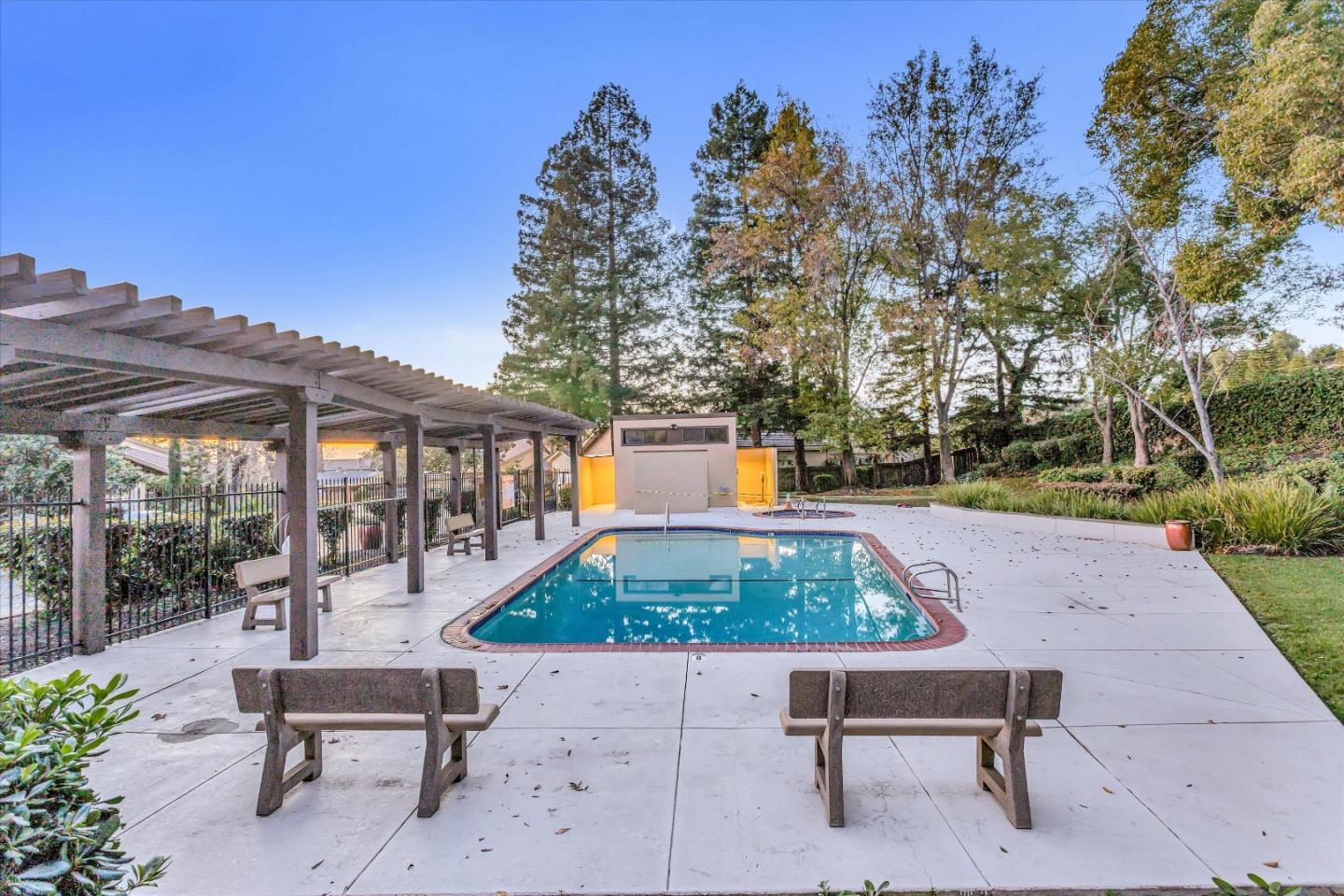 499 Bayview Park Drive Milpitas, CA 95035 - Photo 41 of 41 a wooden bench sitting in front of a building