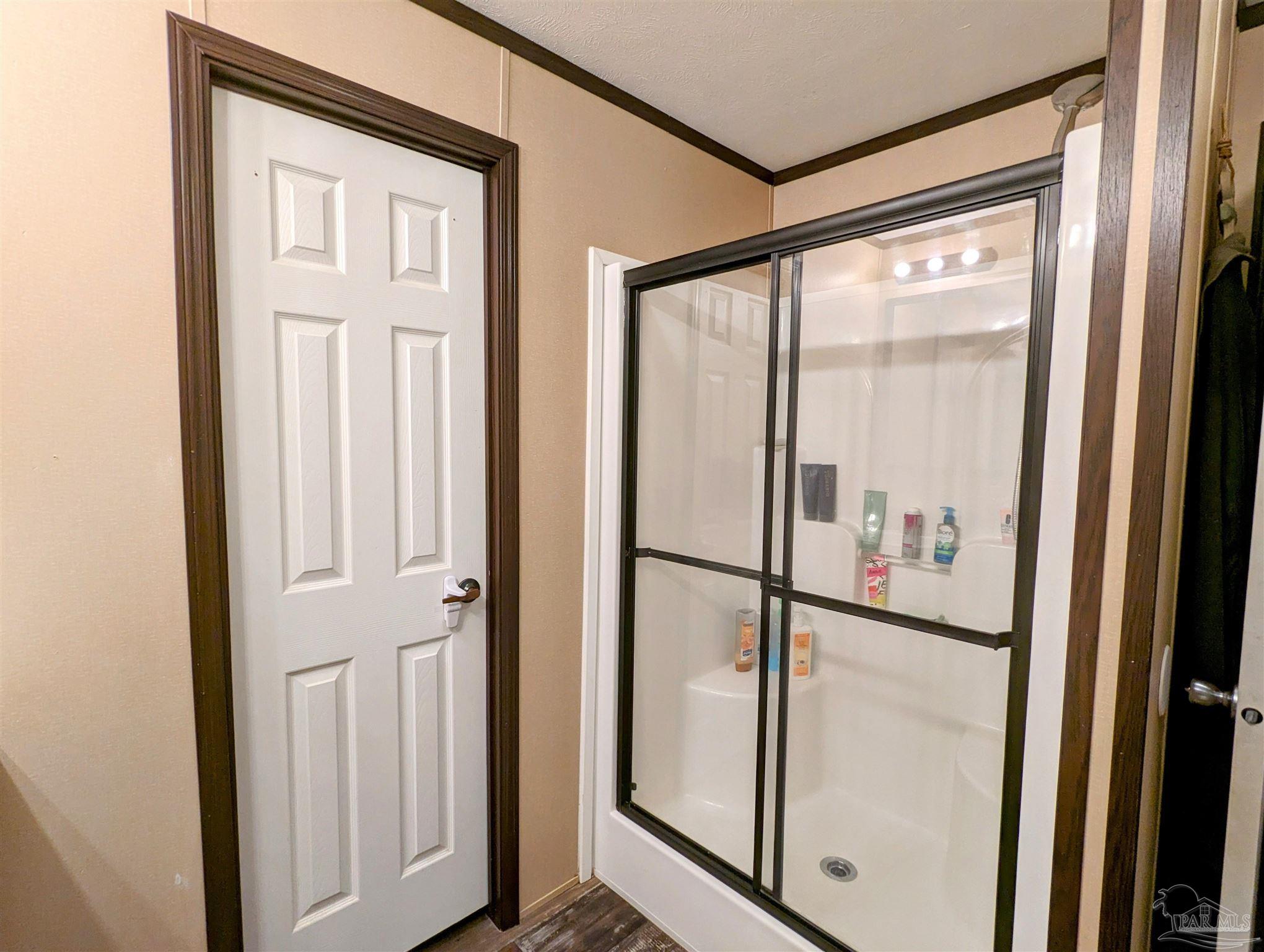 6261 Morgan Road Milton, FL 32570 - Photo 13 of 19 a view of a glass door and a window