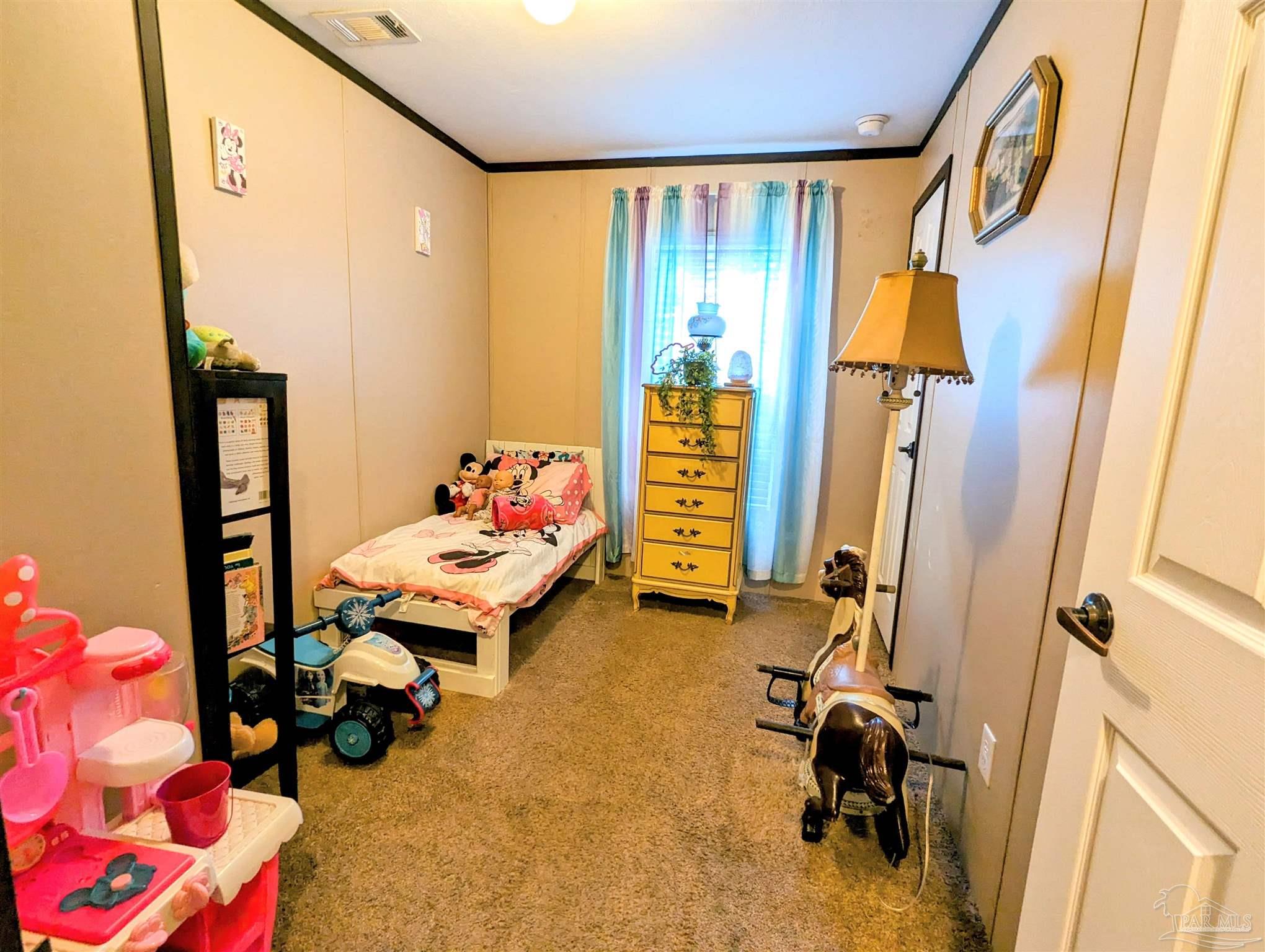 6261 Morgan Road Milton, FL 32570 - Photo 18 of 19 a room with musical instruments