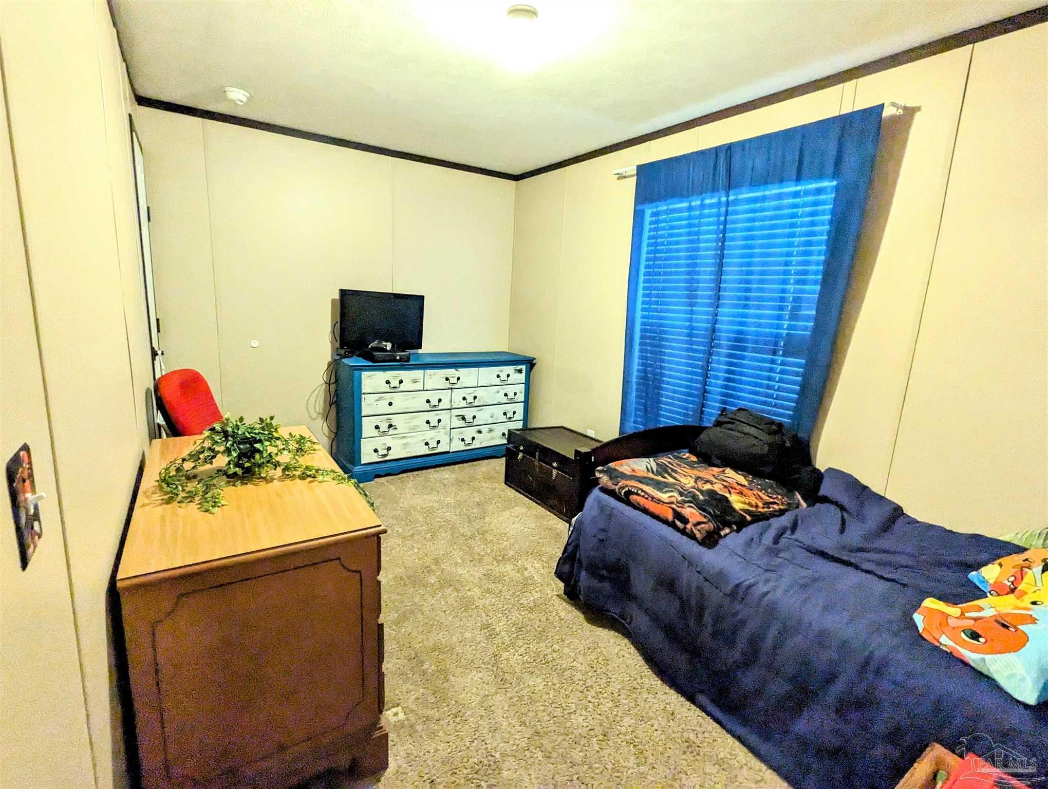 6261 Morgan Road Milton, FL 32570 - Photo 19 of 19 a living room with furniture