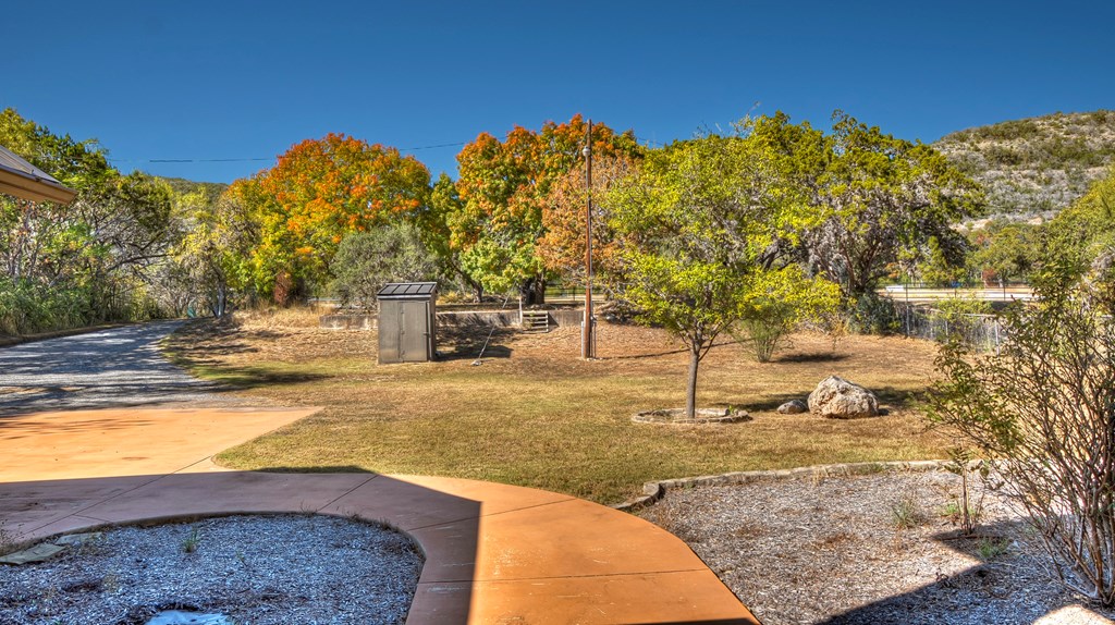 6454 Highway 83 Leakey, TX 78873 - Photo 20 of 74 a view of a backyard with swimming pool