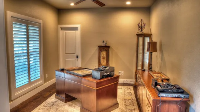 a kitchen with stainless steel appliances granite countertop a stove and cabinets