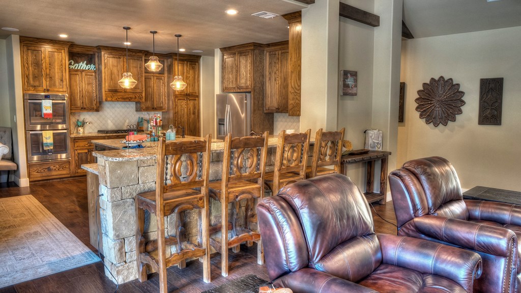 6454 Highway 83 Leakey, TX 78873 - Photo 27 of 74 a living room with furniture kitchen view and a large window