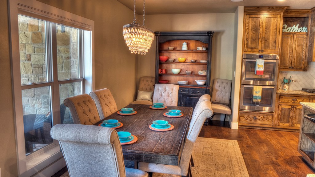 6454 Highway 83 Leakey, TX 78873 - Photo 28 of 74 a view of a dining room with furniture and wooden floor