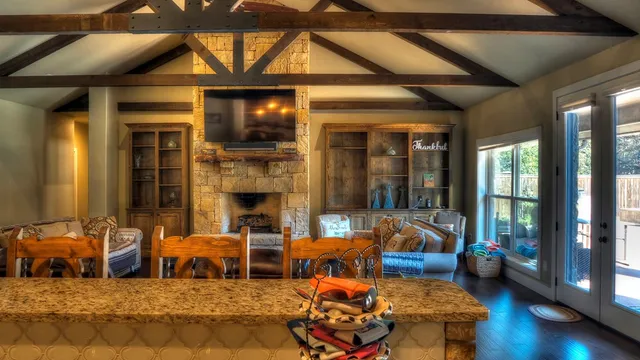 a view of living room with furniture and wooden floor