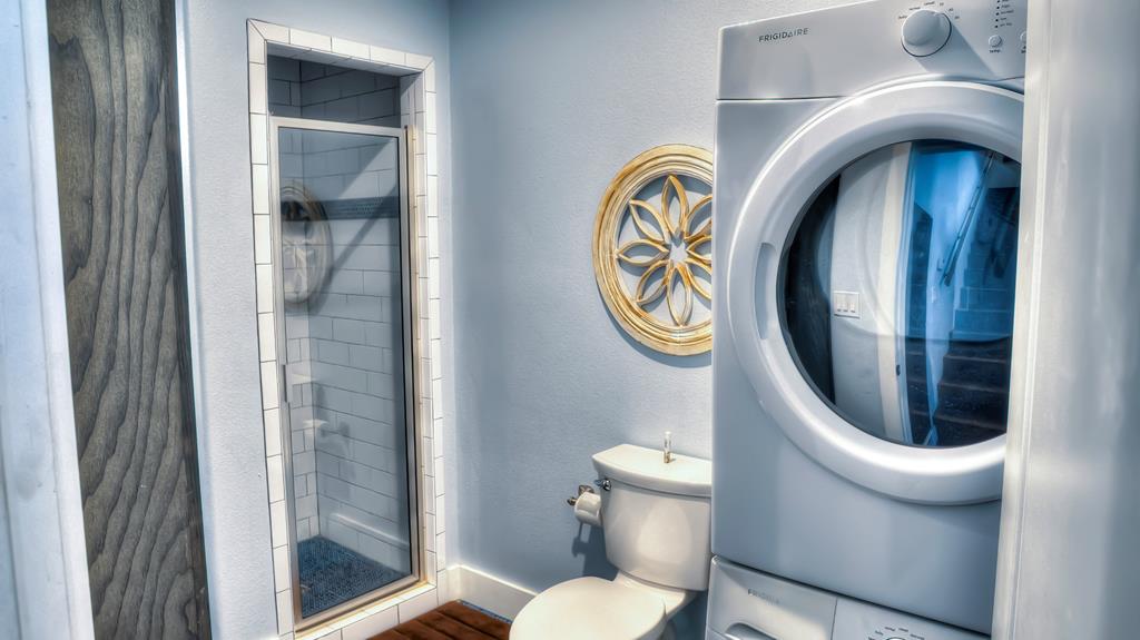 6454 Highway 83 Leakey, TX 78873 - Photo 61 of 74 a close view of a bathroom with a toilet and a sink