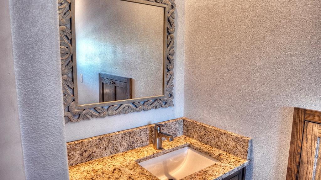 6454 Highway 83 Leakey, TX 78873 - Photo 65 of 74 a bathroom with a tub and sink