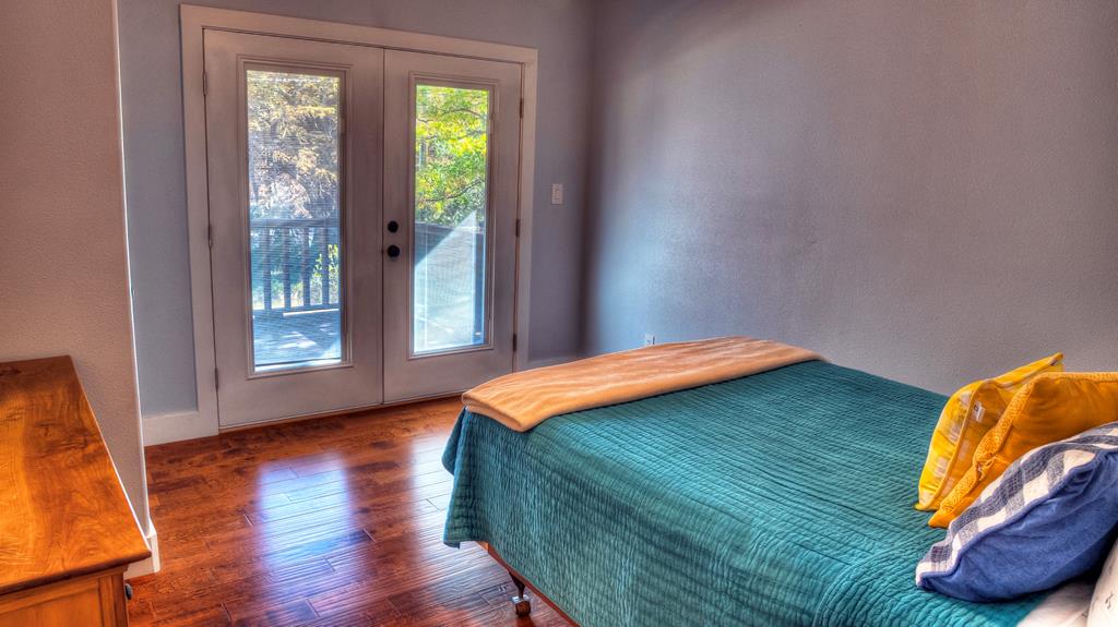 6454 Highway 83 Leakey, TX 78873 - Photo 66 of 74 a bedroom with a bed and window