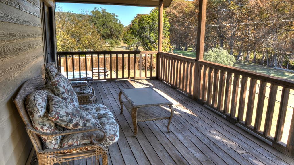 6454 Highway 83 Leakey, TX 78873 - Photo 68 of 74 a view of balcony with wooden floor