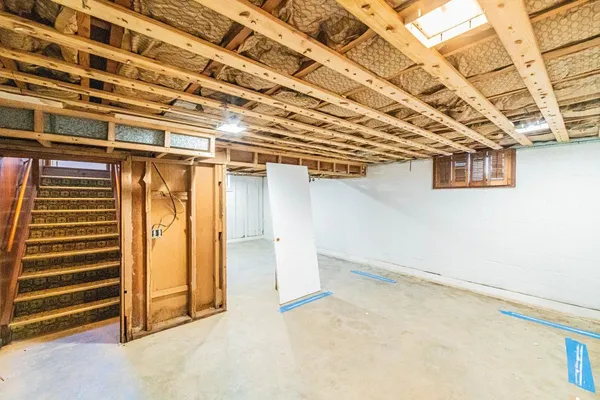 a view of a room with wooden walls