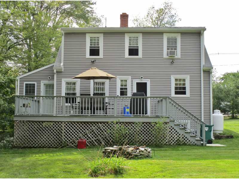 1460 Chopmist Hill Road Scituate, RI 02857 - Photo 19 of 25 Exterior Back. Over Sized Deck Overlooking Pristine Yard