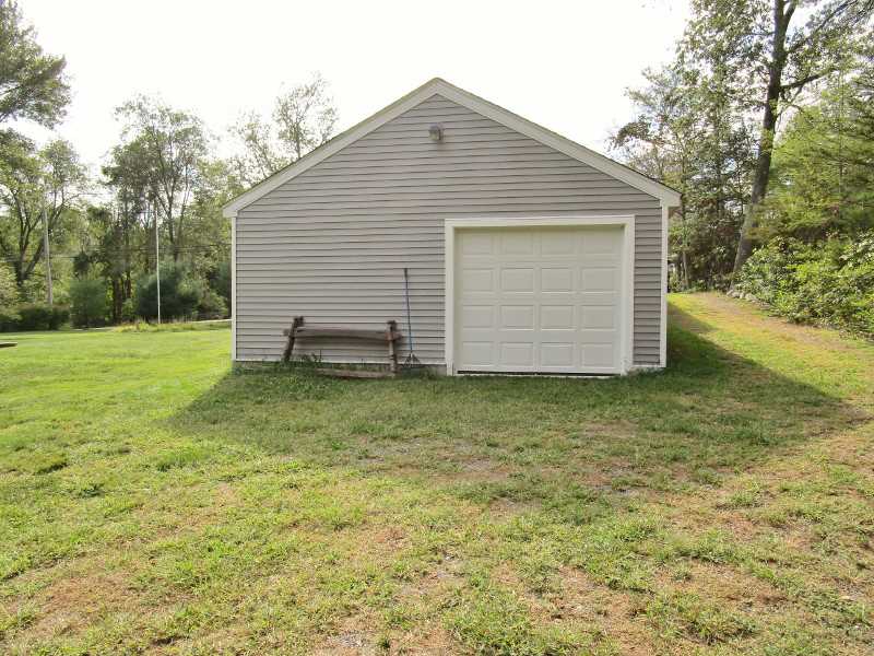 1460 Chopmist Hill Road Scituate, RI 02857 - Photo 23 of 25 Garage. 3rd. Garage Space in Rear of 2 Car Garage, Currently Used as a Work Shop.