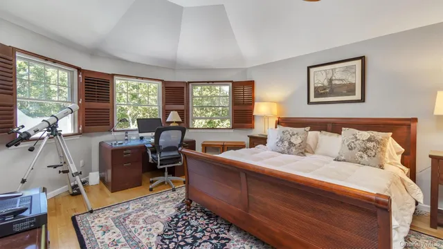a view of kitchen with furniture and refrigerator