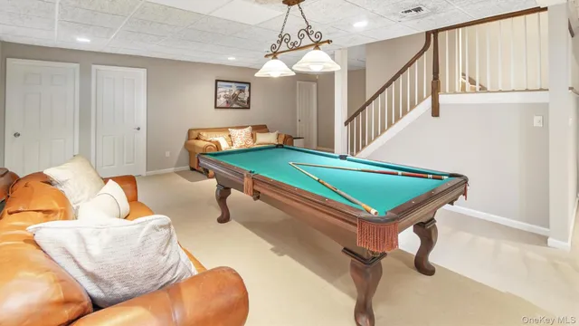 a room with gym equipment and a large window