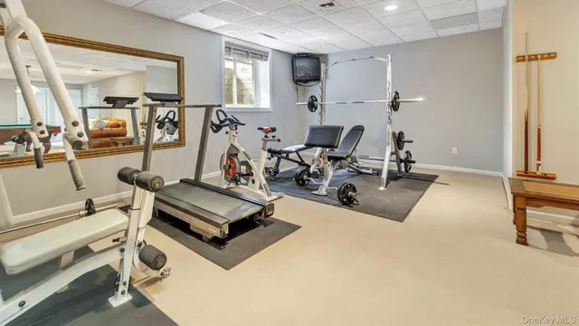 a room with furniture and a window