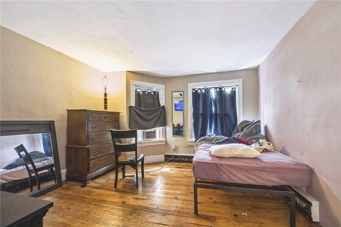 1030 Monocacy Street Bethlehem, PA 18018 - Photo 20 of 34 Original hardwood floors add classic character to this bedroom layout.