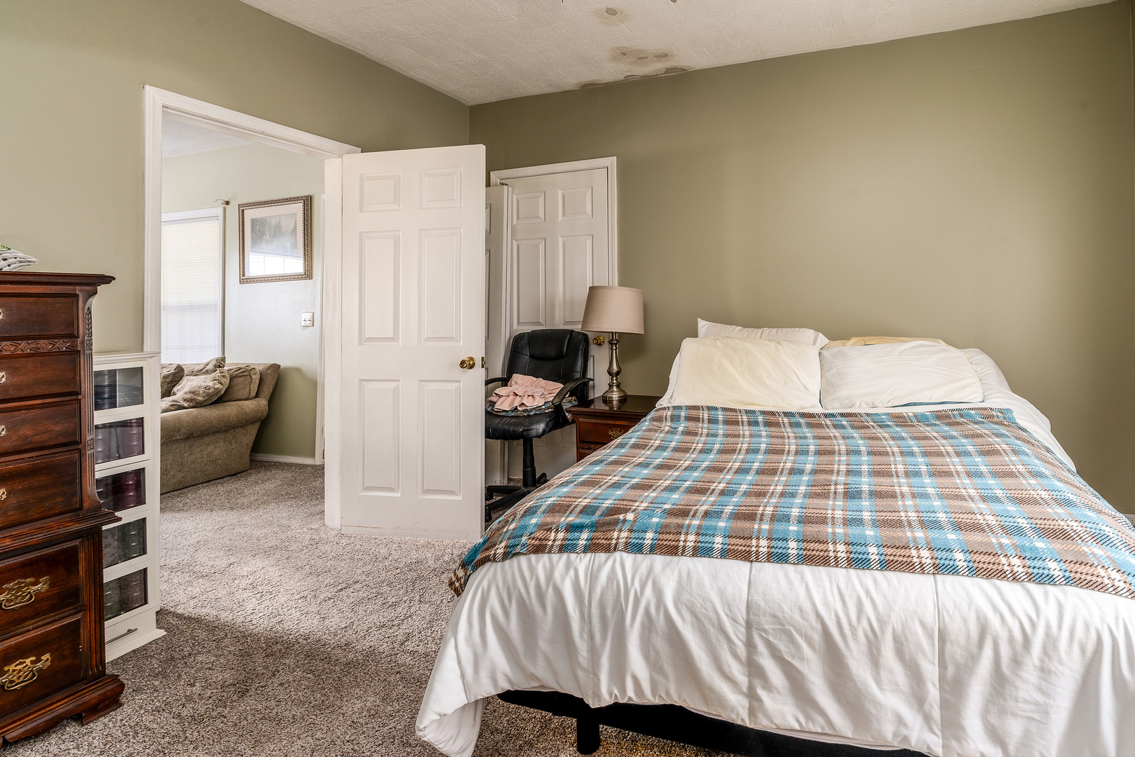 202 South Ervin Street Pittsburg, IL 62974 - Photo 14 of 42 a bedroom with a bed and a cabinets