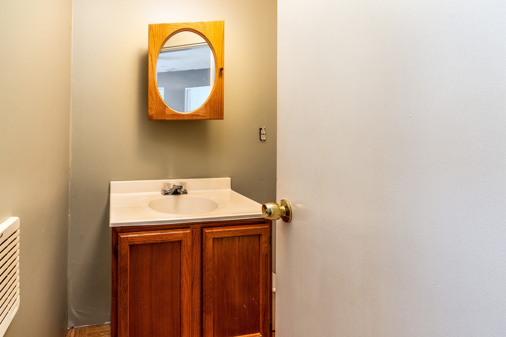 202 South Ervin Street Pittsburg, IL 62974 - Photo 15 of 42 a bathroom with a sink and a mirror