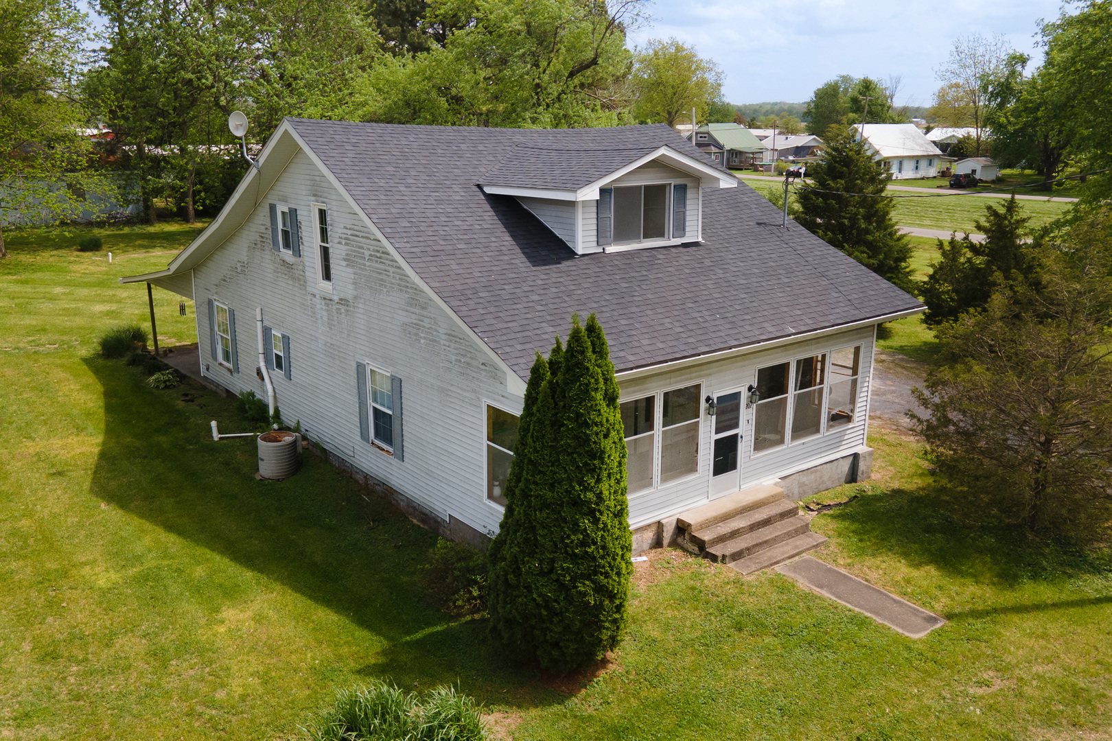 202 South Ervin Street Pittsburg, IL 62974 - Photo 2 of 42 a aerial view of a house with yard porch and green space