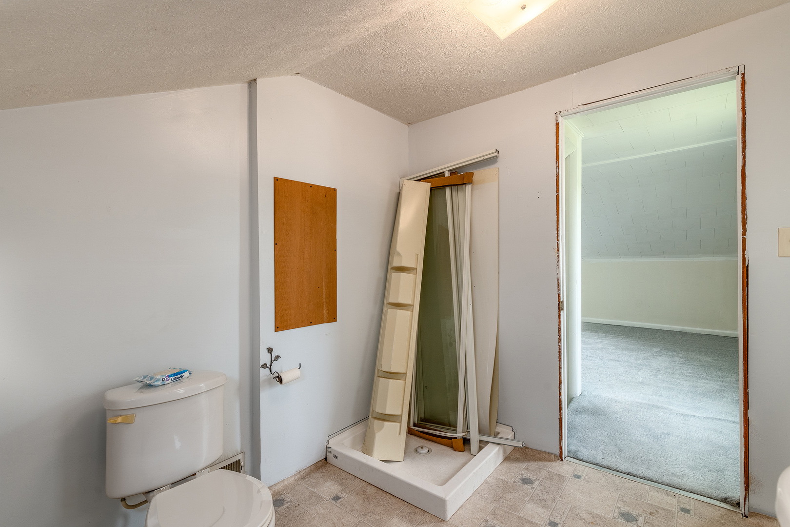 202 South Ervin Street Pittsburg, IL 62974 - Photo 28 of 42 a bathroom with a granite countertop sink a toilet and shower