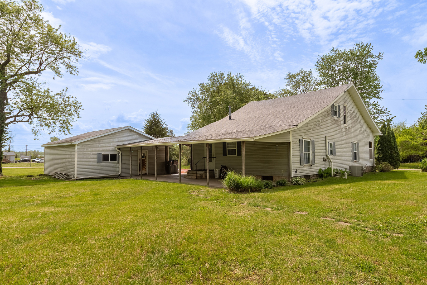 202 South Ervin Street Pittsburg, IL 62974 - Photo 31 of 42 a front view of house with yard and trees in front of it