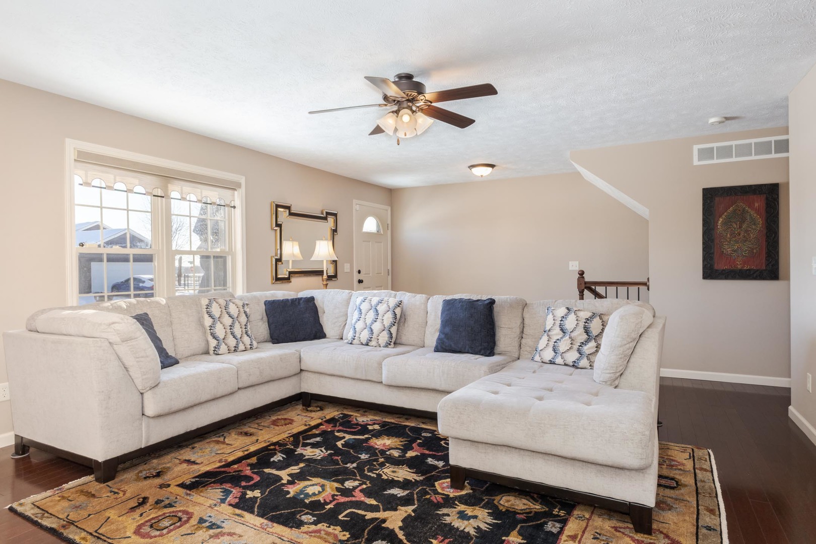 1646 Belclare Road Normal, IL 61761 - Photo 15 of 50 a living room with furniture and a large window