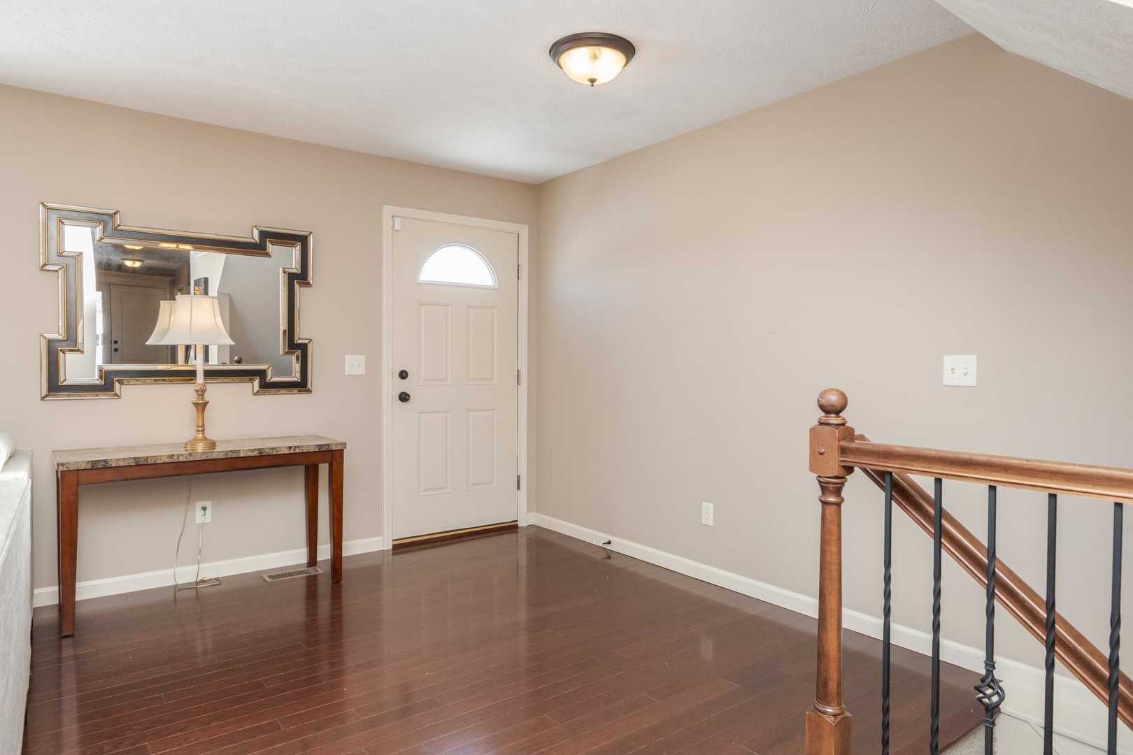 1646 Belclare Road Normal, IL 61761 - Photo 18 of 50 a view of a hallway with wooden floor and staircase