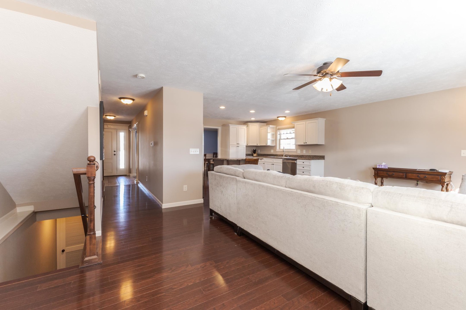 1646 Belclare Road Normal, IL 61761 - Photo 19 of 50 a living room with furniture and kitchen view