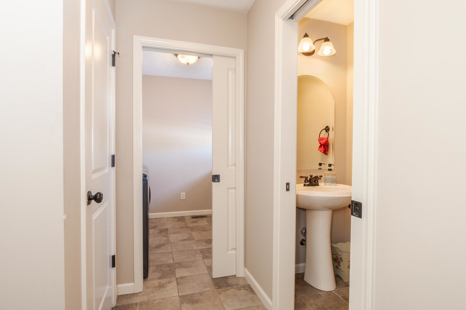 1646 Belclare Road Normal, IL 61761 - Photo 20 of 50 a view of a bathroom with a sink and mirror