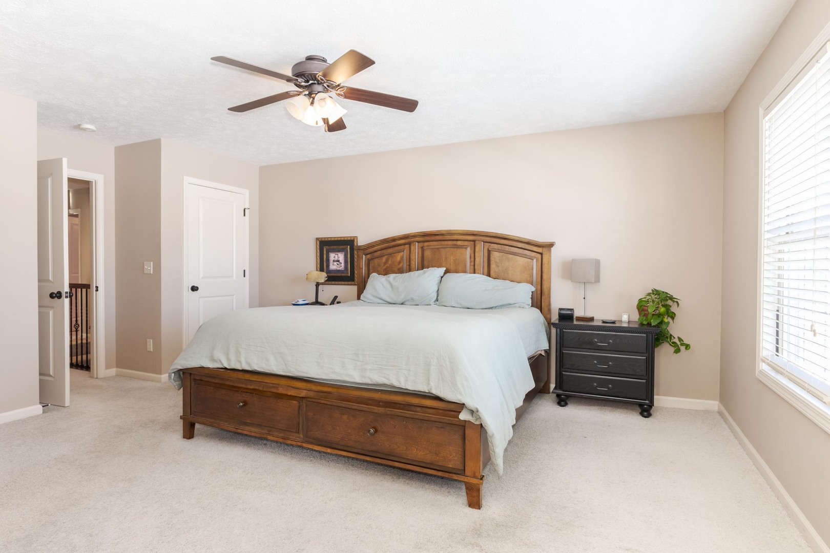 1646 Belclare Road Normal, IL 61761 - Photo 24 of 50 a bedroom with a bed and window