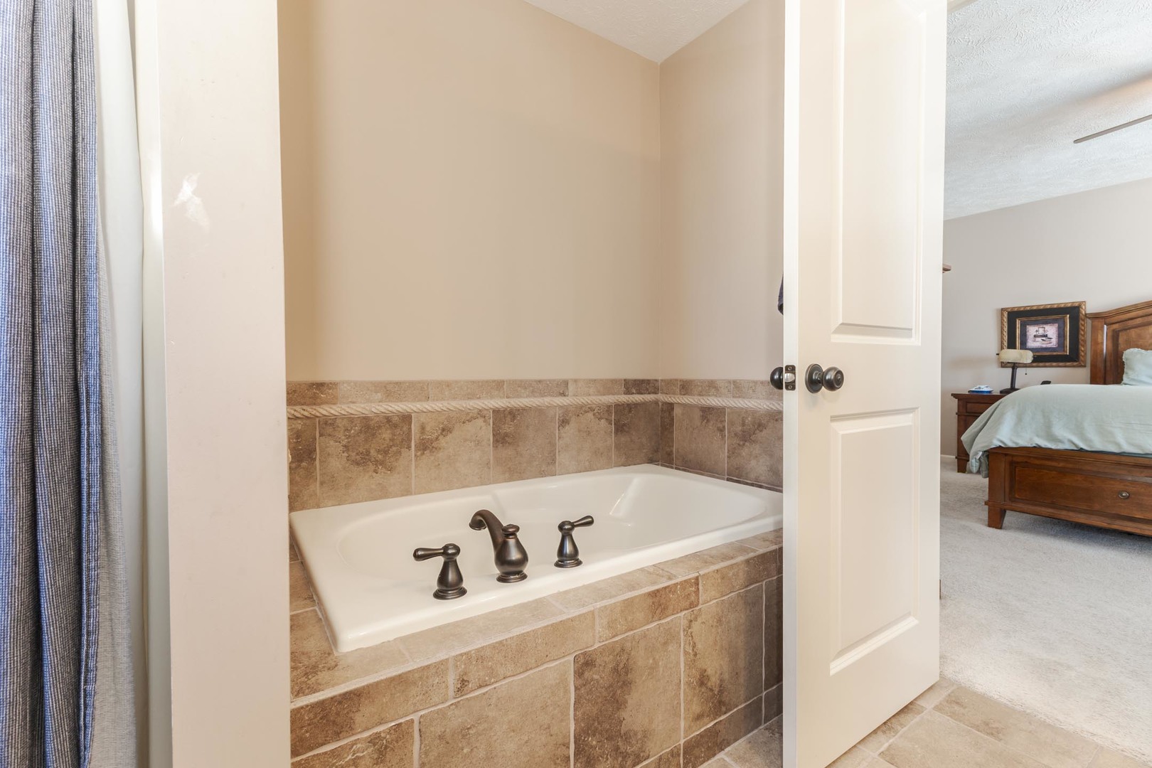 1646 Belclare Road Normal, IL 61761 - Photo 29 of 50 a bath tub sitting next to a bathroom sink