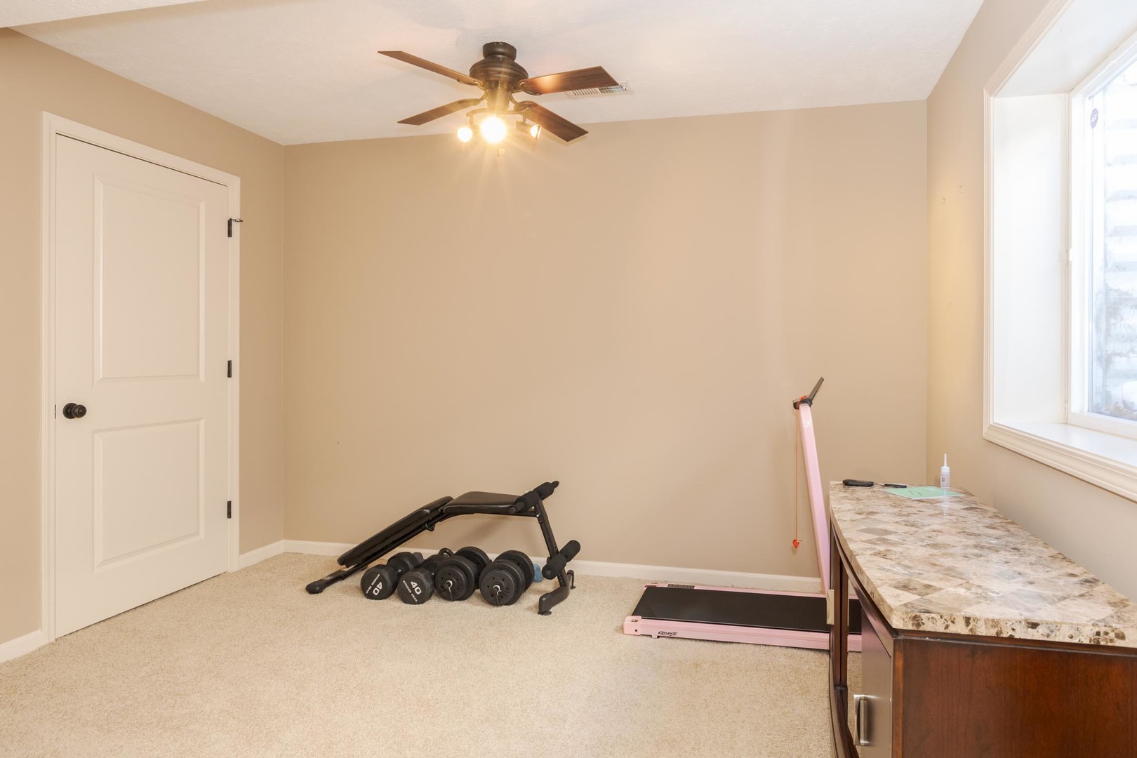 1646 Belclare Road Normal, IL 61761 - Photo 40 of 50 a room with a bed and a chandelier