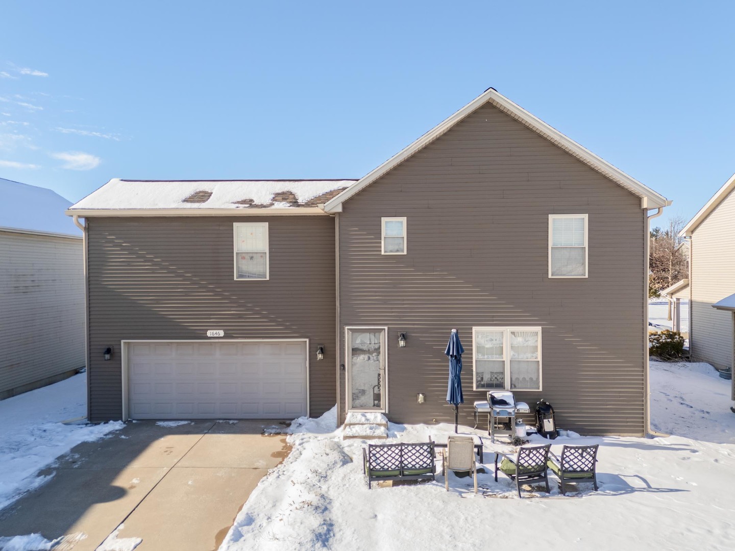 1646 Belclare Road Normal, IL 61761 - Photo 44 of 50 a bedroom with a bed and lamp
