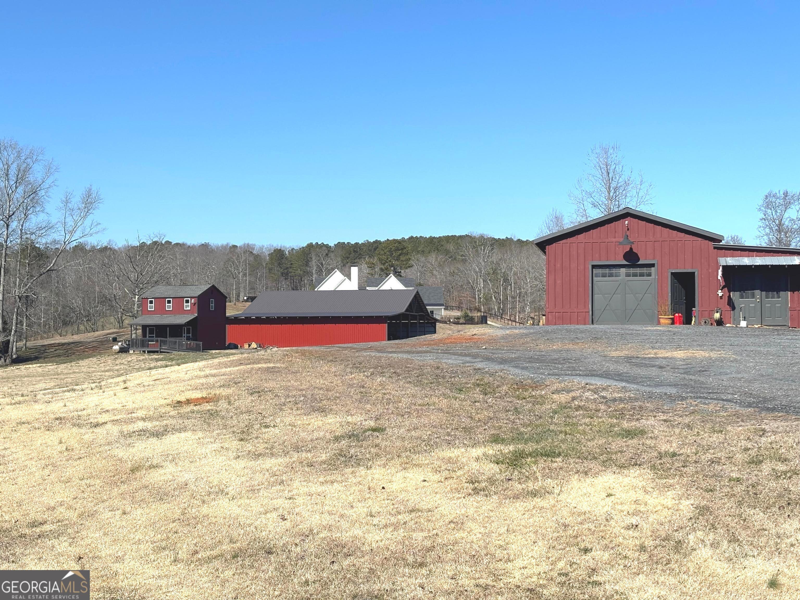 114 Addington Lane, Unit 5 Waleska, GA 30183 - Photo 13 of 31 a front view of a house with a yard