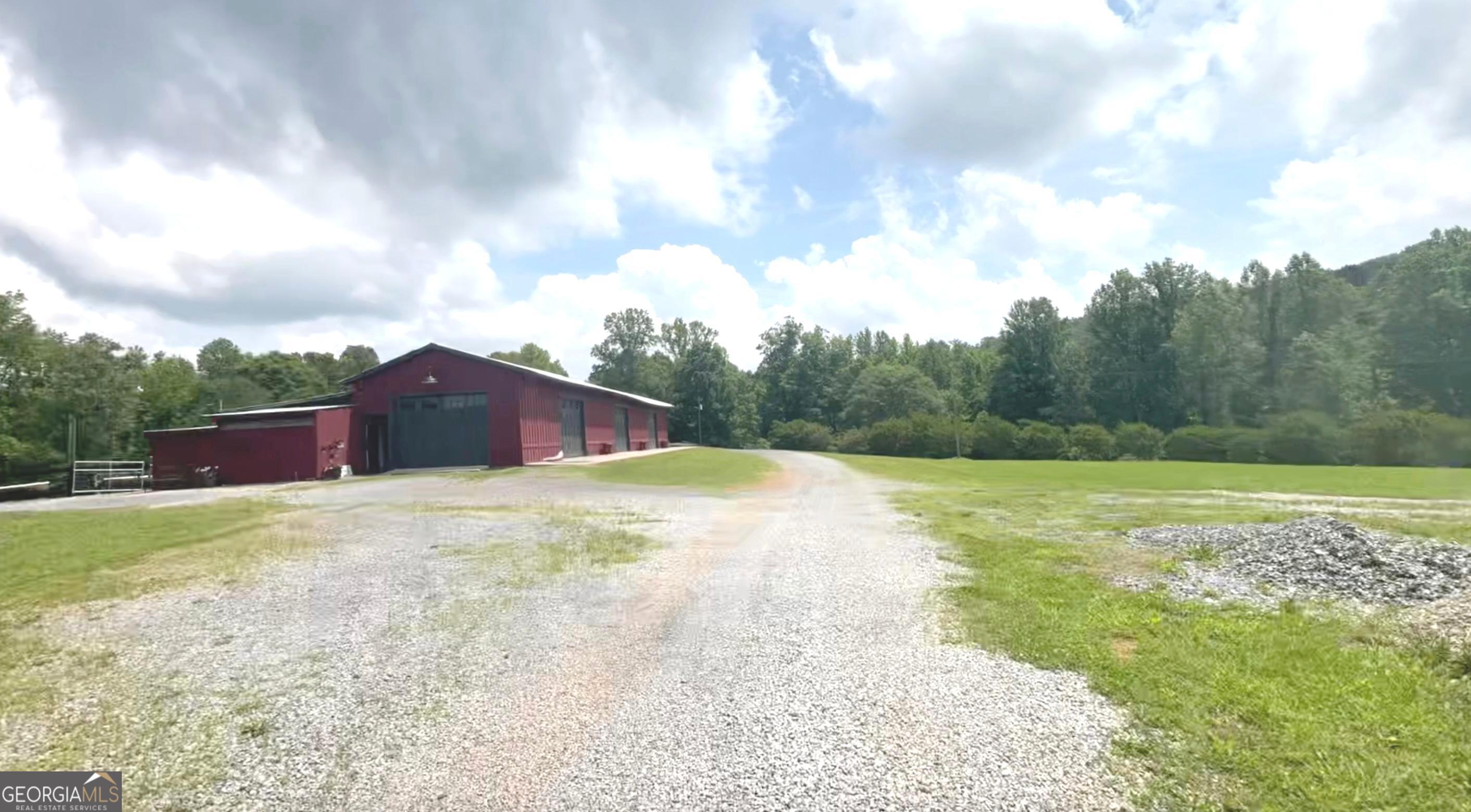 114 Addington Lane, Unit 5 Waleska, GA 30183 - Photo 14 of 35 a backyard of a house