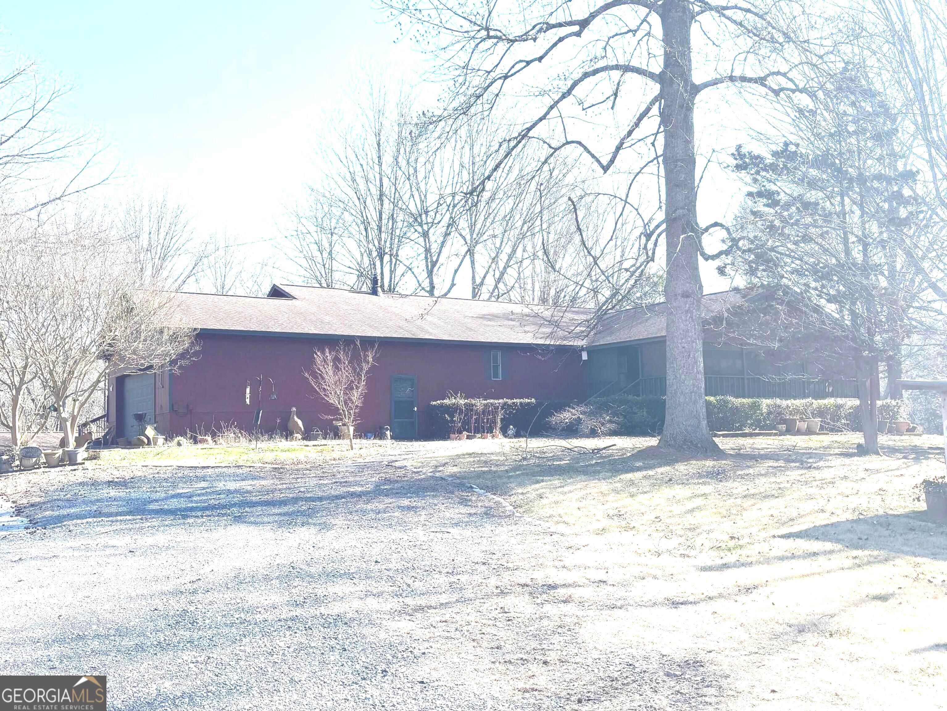 114 Addington Lane, Unit 5 Waleska, GA 30183 - Photo 4 of 35 a view of a yard with a large tree