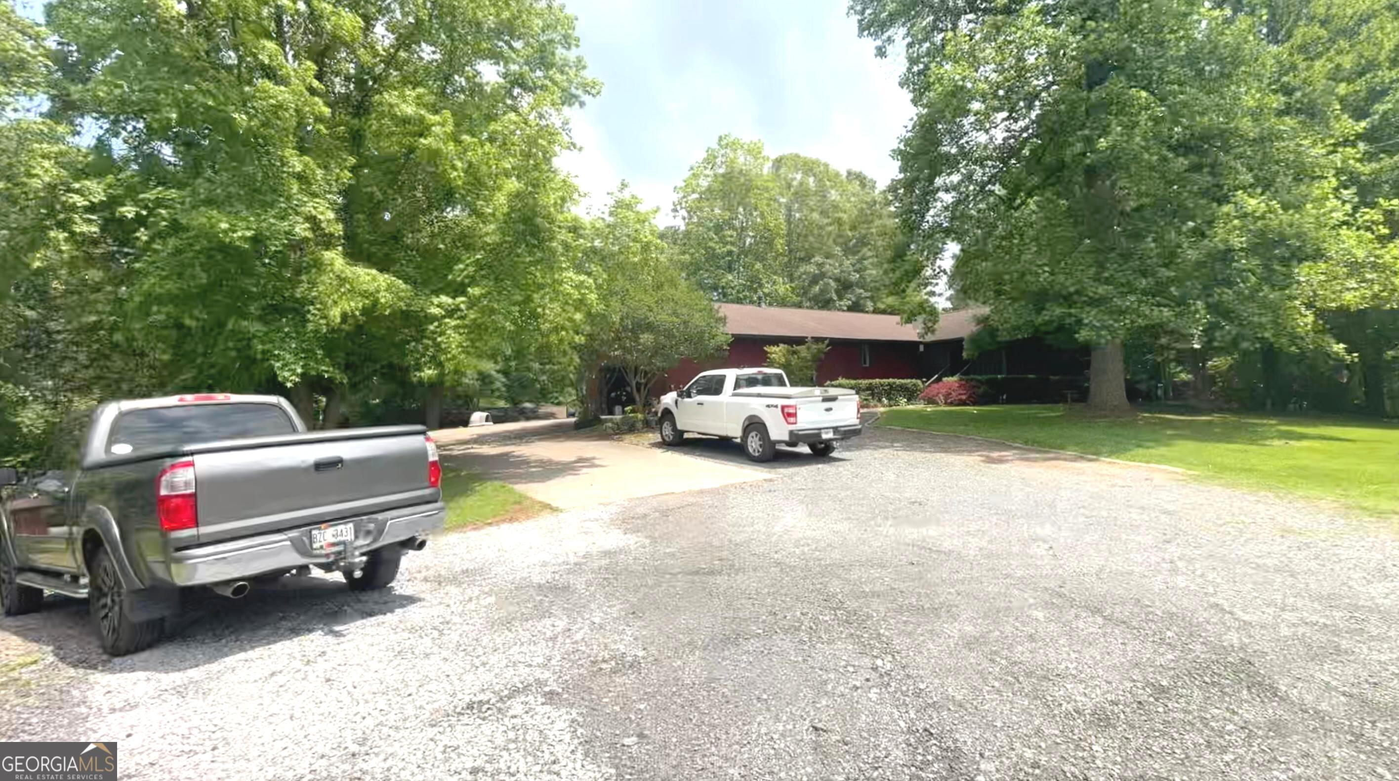 114 Addington Lane, Unit 5 Waleska, GA 30183 - Photo 5 of 35 a car parked on the side of the road