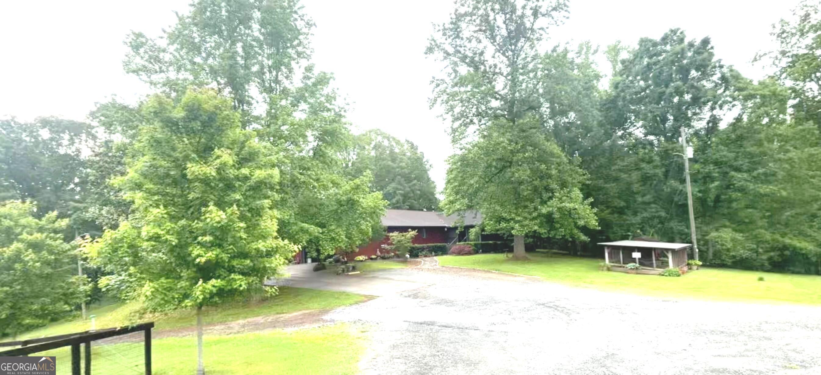 114 Addington Lane, Unit 5 Waleska, GA 30183 - Photo 6 of 35 a view of a house with pool