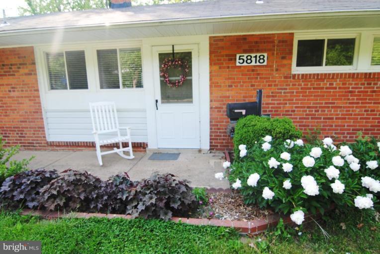 5818 Atteentee Road Springfield, VA 22150 - Photo 18 of 22 Lovely flowers at entry.