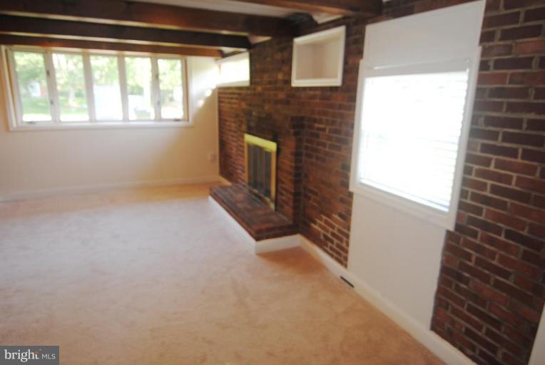 5818 Atteentee Road Springfield, VA 22150 - Photo 20 of 22 Bow window and fireplace.