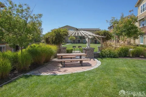 a garden view with a seating space