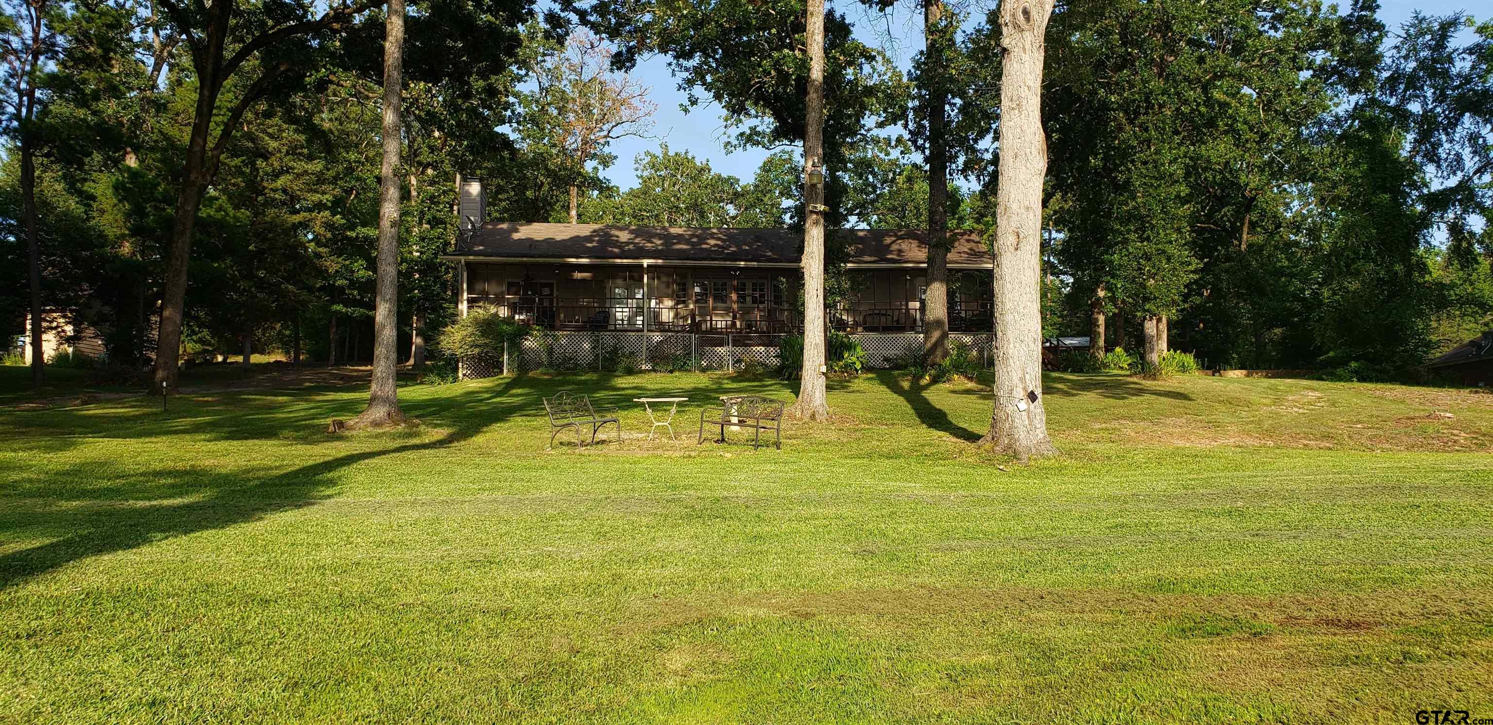 14032 Eastside Road Tyler, TX 75707 - Photo 17 of 36 a view of a playground with tree s