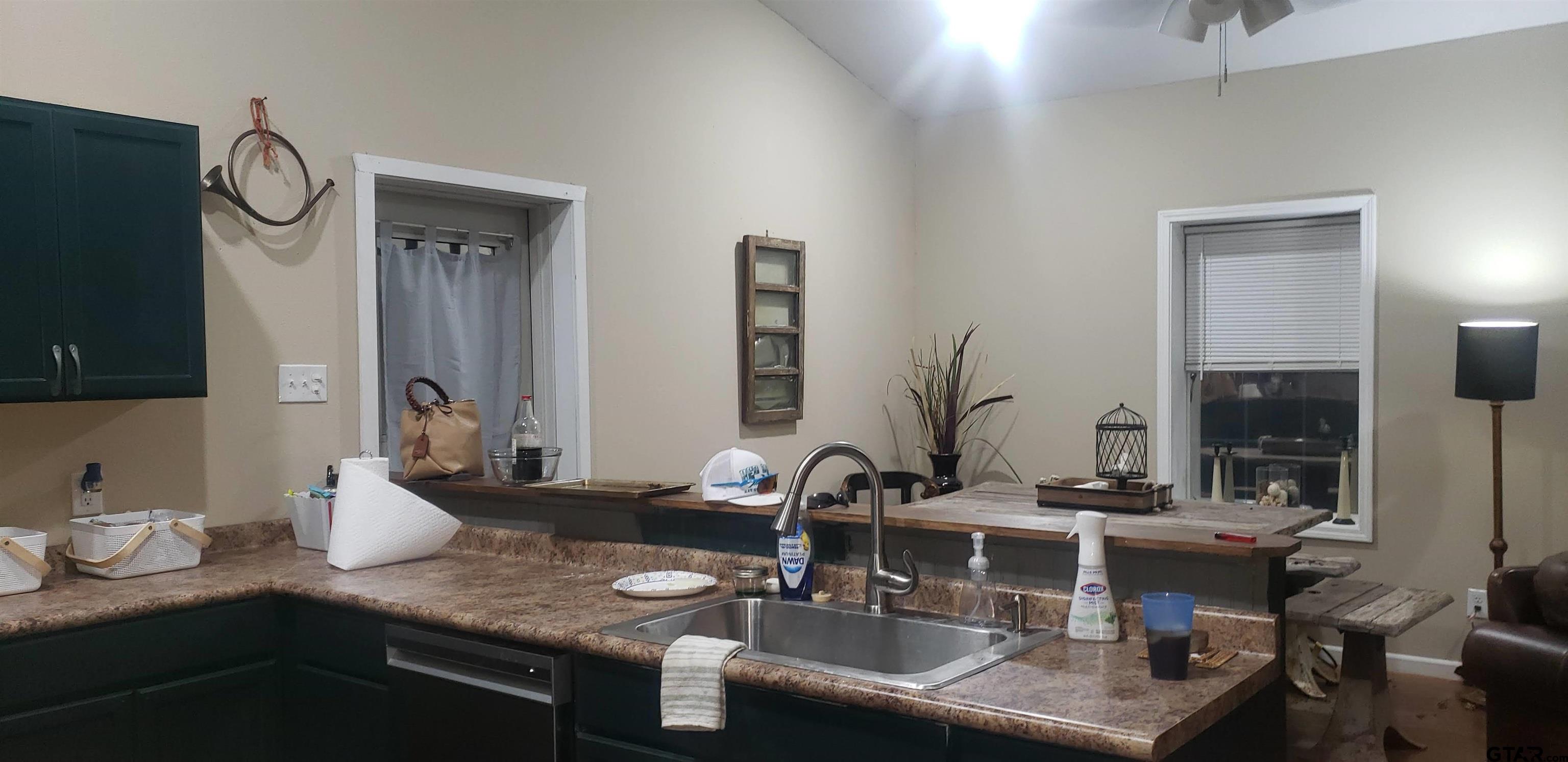 14032 Eastside Road Tyler, TX 75707 - Photo 29 of 36 a bathroom with double vanity sinks and a mirror