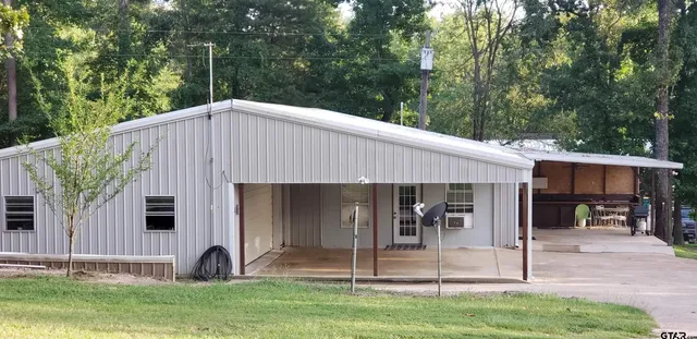 a view of a house with a swimming pool