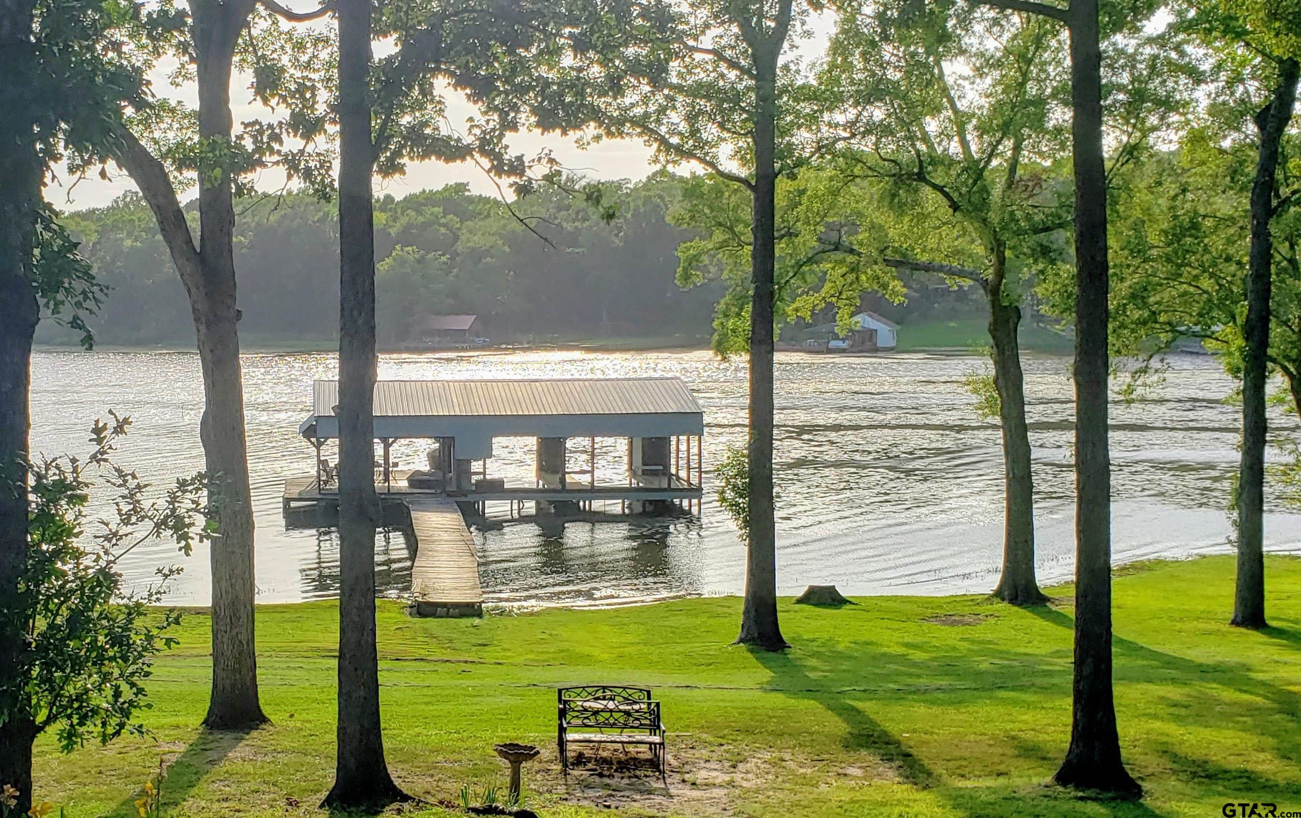 14032 Eastside Road Tyler, TX 75707 - Photo 5 of 36 a view of a garden with an ocean view