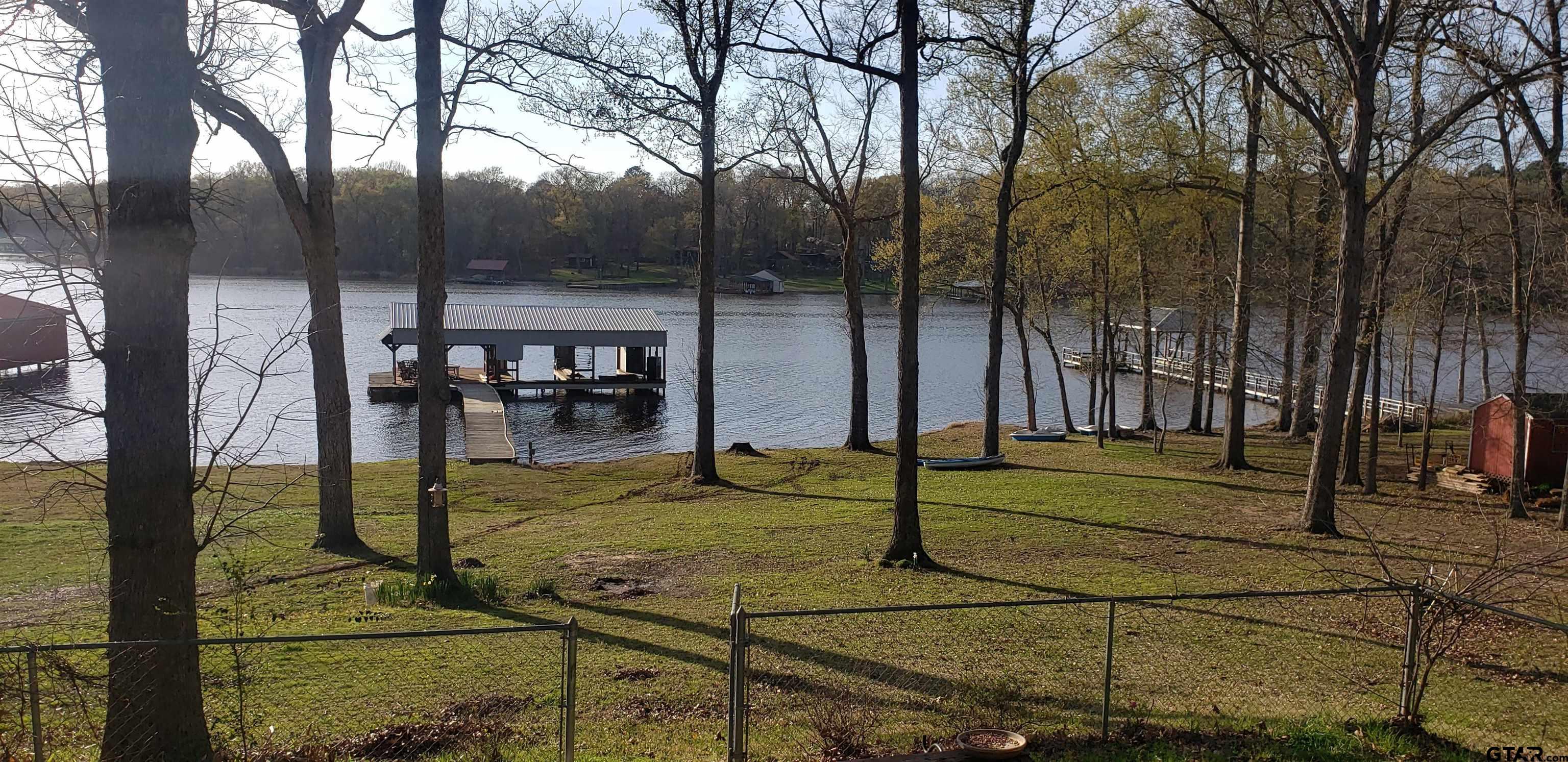 14032 Eastside Road Tyler, TX 75707 - Photo 9 of 36 a view of a backyard