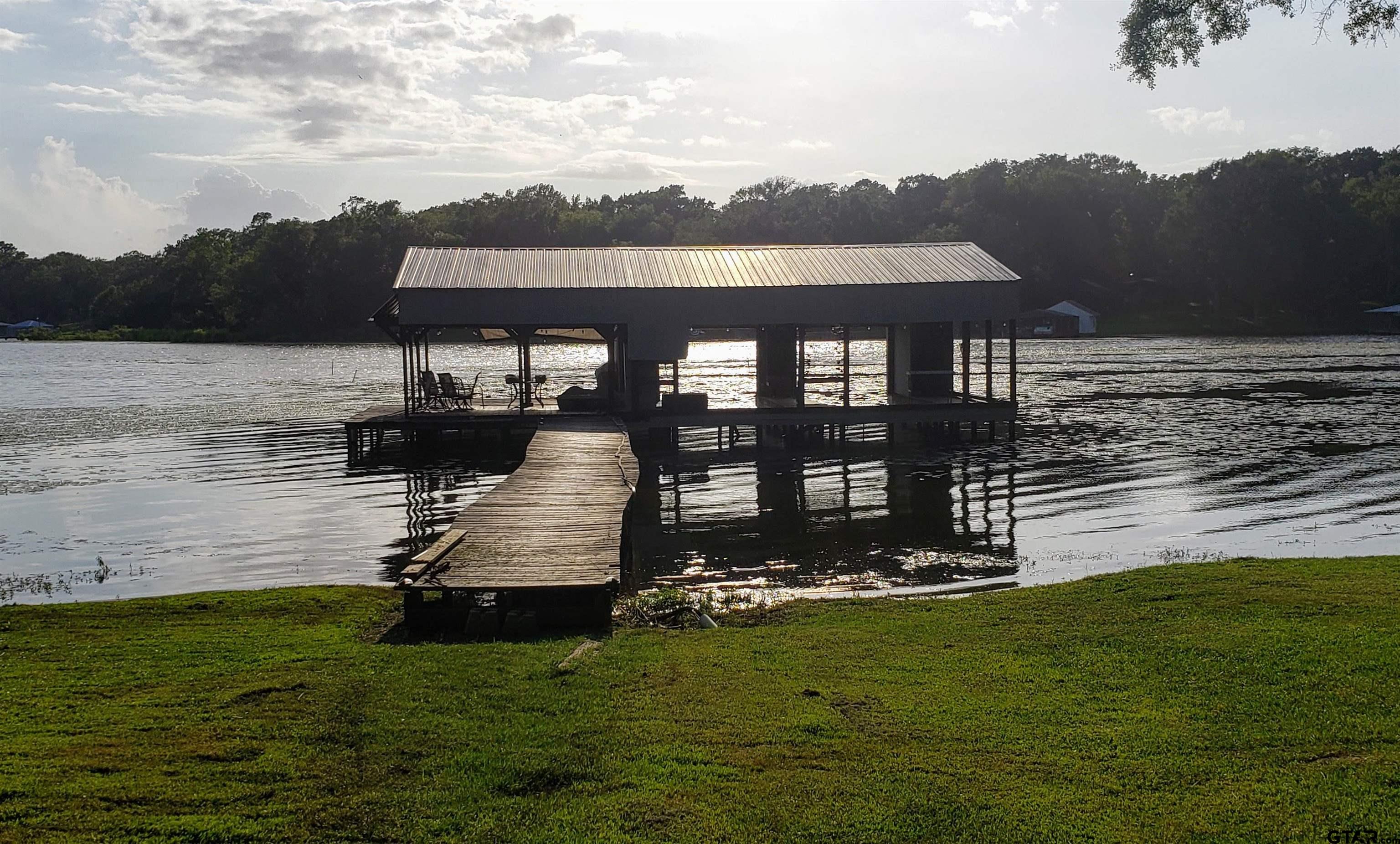 14032 Eastside Road Tyler, TX 75707 - Photo 10 of 36 a view of a house with a yard