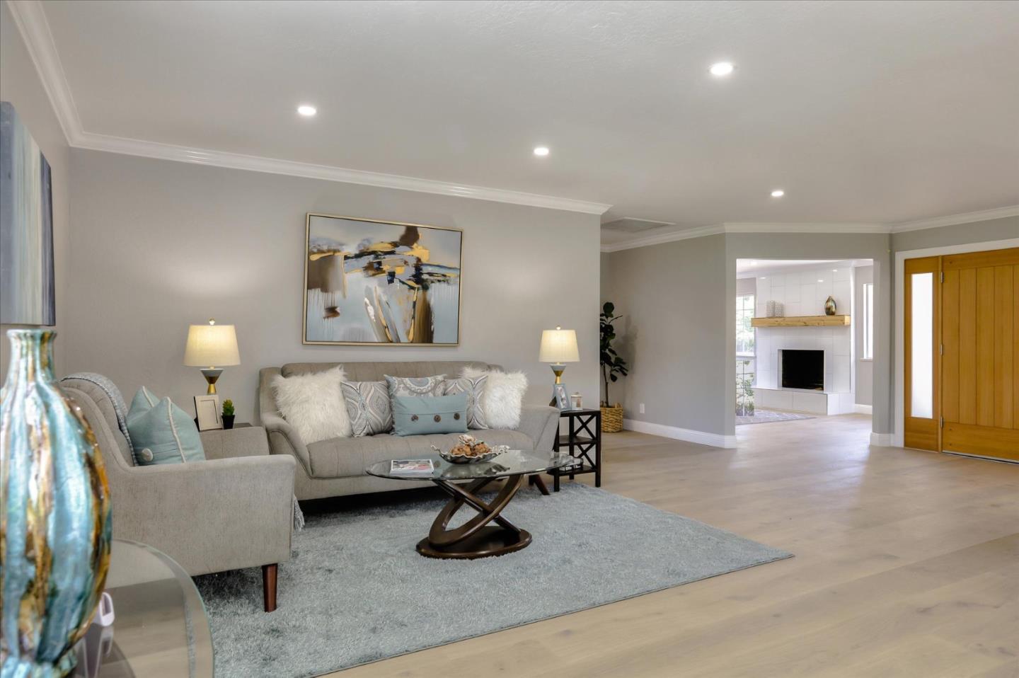 1241 Wasatch Drive Mountain View, CA 94040 - Photo 12 of 66 a living room with furniture and a dining table with kitchen view