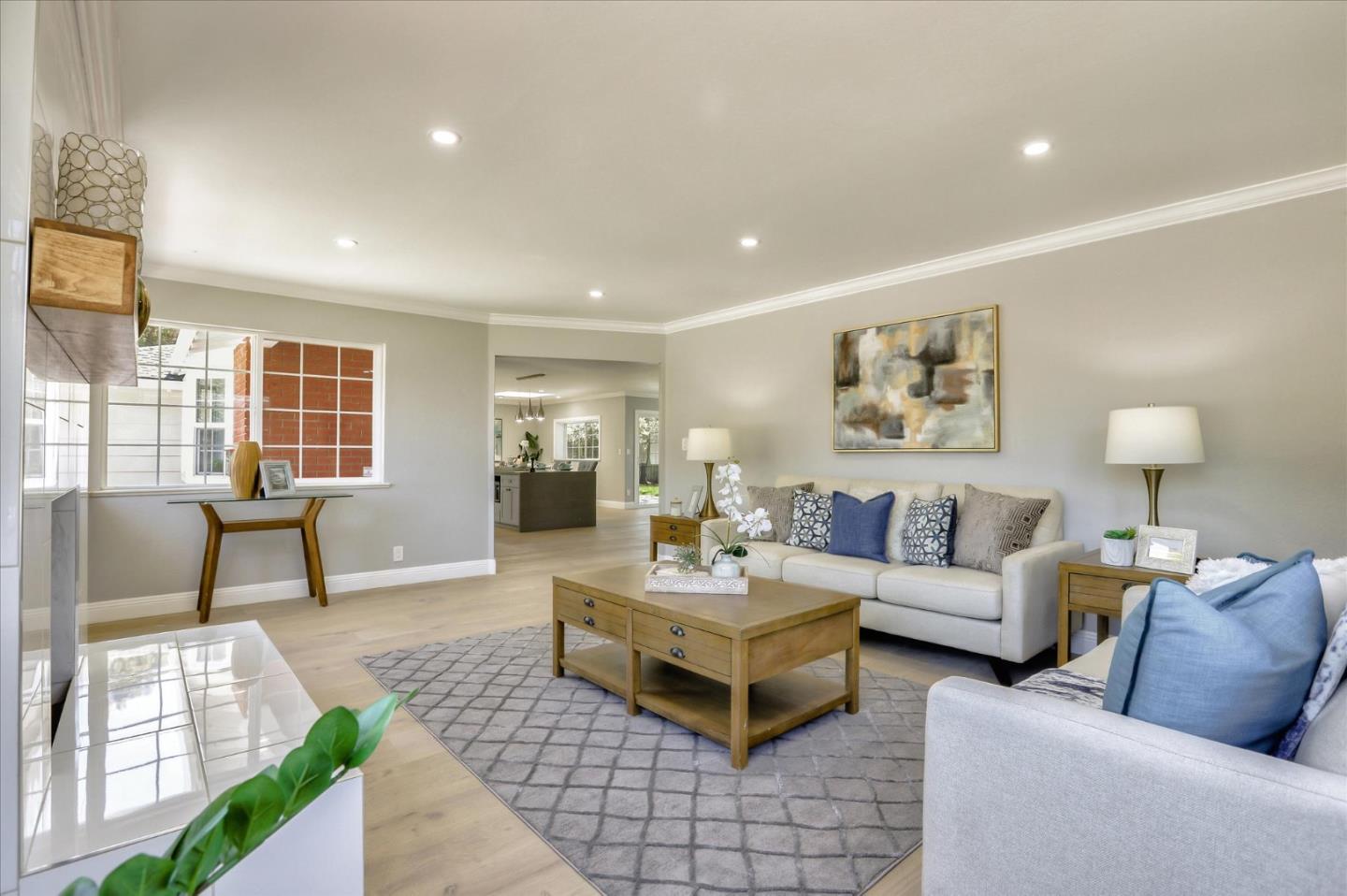 1241 Wasatch Drive Mountain View, CA 94040 - Photo 17 of 66 a living room with furniture and a table